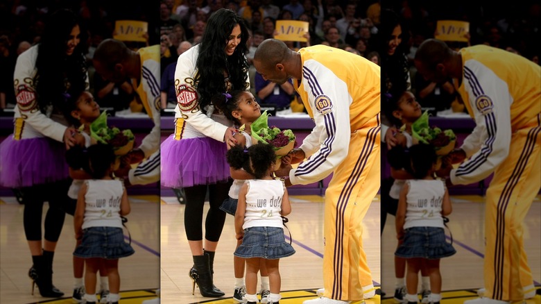 Vanessa and Kobe on the court when he received his MVP award