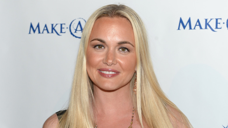 Vanessa Trump smiling and posing at event.