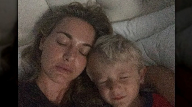 Vanessa Trump posing with her son