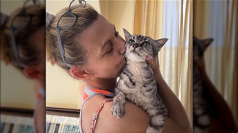 Vanna White cuddles her cat 