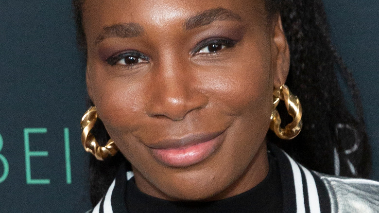 Venus Williams smirks on the red carpet