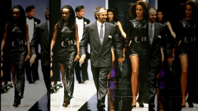 Gianni Versace walks the runway