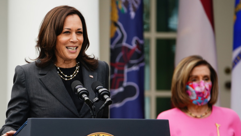 Kamala Harris alongside Nancy Pelosi