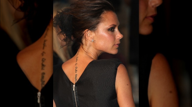 Victoria Beckham profile back tattoo