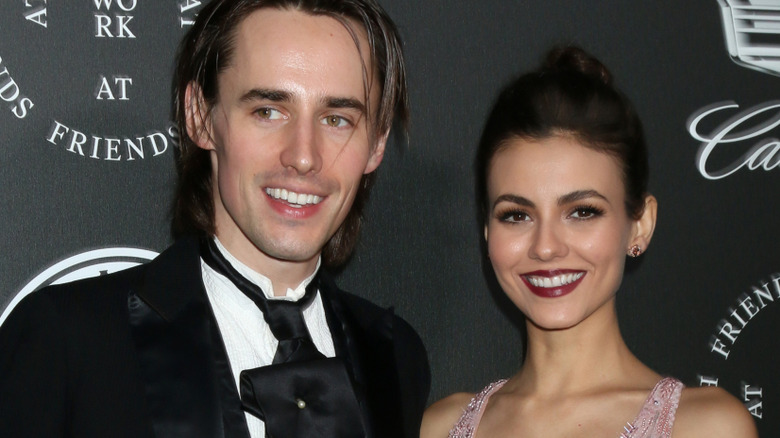 Reeve Carney and Victoria Justice smiling