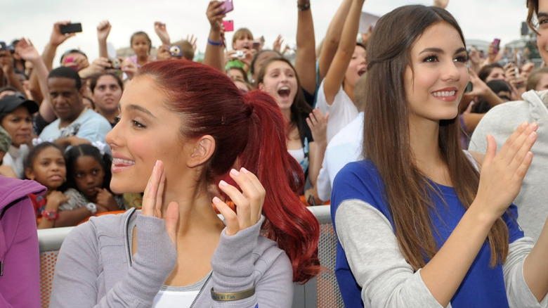 Ariana Grande and Victoria Justice clapping