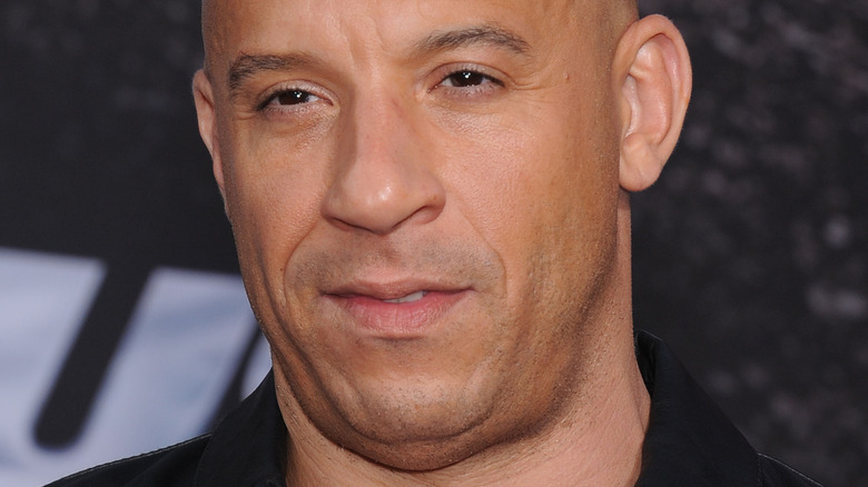 Vin Diesel on the red carpet with serious expression