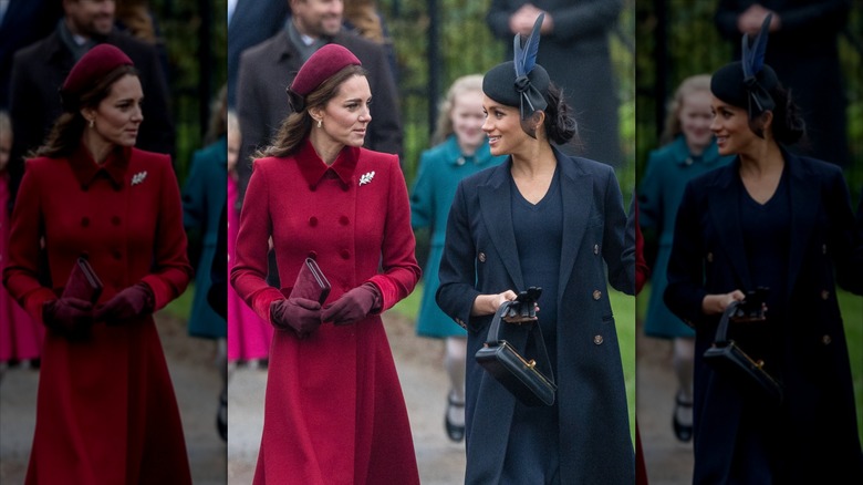 Kate Middleton and Meghan Markle looking at each other while walking together