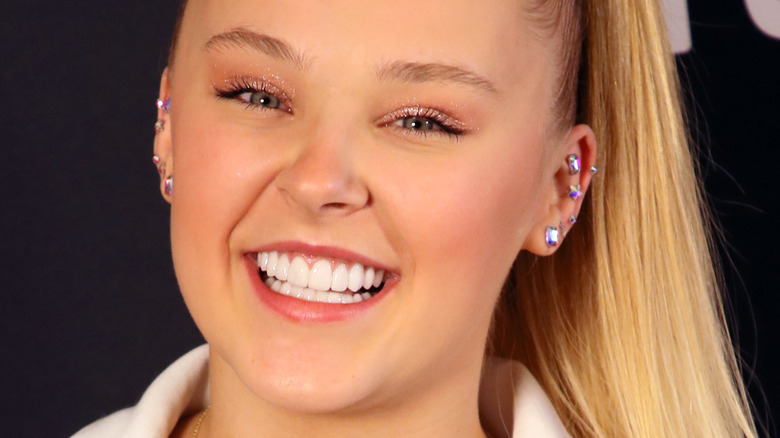 Jojo Siwa smiling at an event