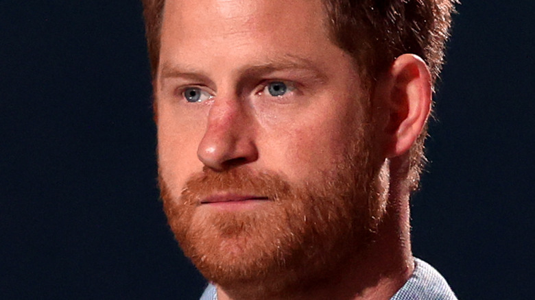 Prince Harry with a serious expression