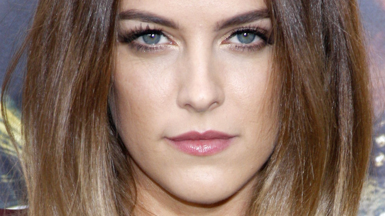 Riley Keough gives the camera a blue steel look