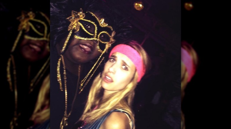 Emma Roberts and Gabourey Sidibe wearing costumes