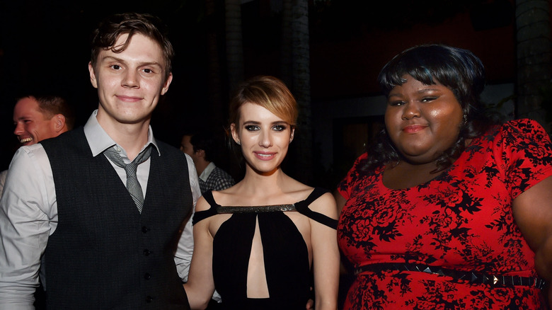 Evan Peters, Emma Roberts, and Gabourey Sidibe at an event
