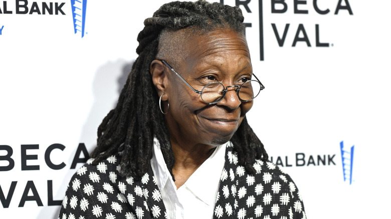 Whoopi Goldberg posing at the Tribeca Festival.