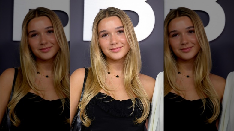 Harper Beckham wearing a black dress at the "Victoria Beckham" World Premiere at the Curzon Mayfair