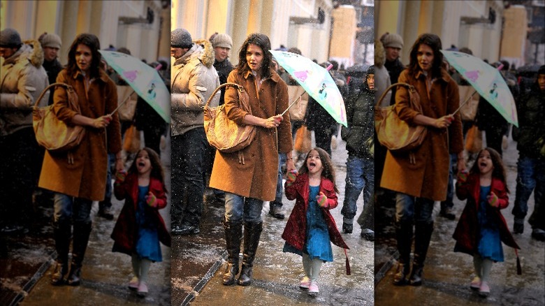 Katie Holmes walks with Suri