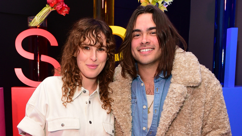 Rumer Willis and Derek Richard Thomas pose in 2022