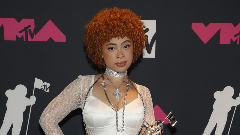 Ice Spice wearing diamond cross