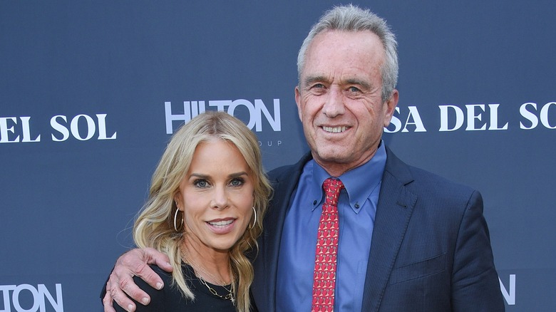 Robert F. Kennedy Jr. with arm around Cheryl Hines