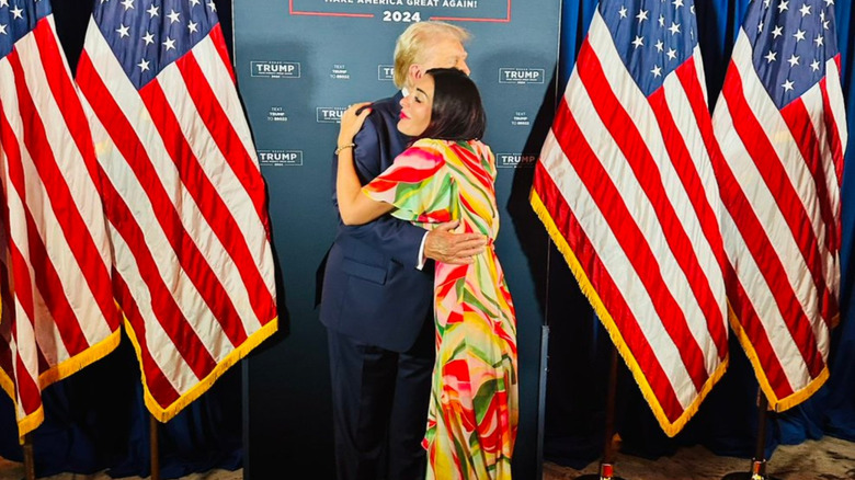 Donald Trump hugging Laura Loomer
