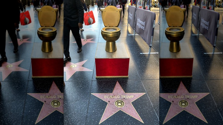 A gold toilet behind Donald Trump's Walk of Fame star