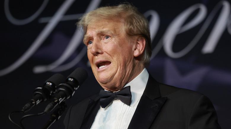 Donald Trump wearing bowtie, speaking at America First Policy Institute Gala