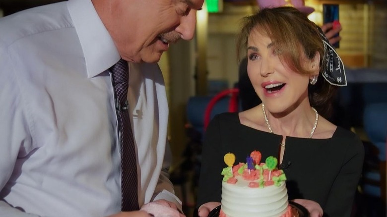 Dr Phil Robin McGraw with cake