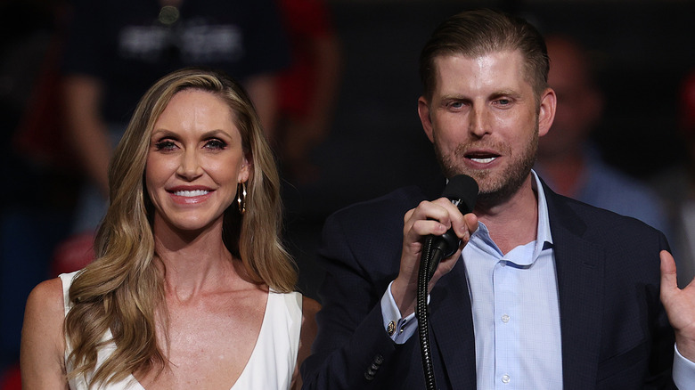 Lara Trump smiling, Eric Trump speaking