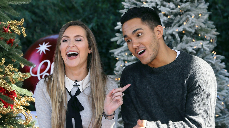 Alexa PenaVega pointing at Carlos PenaVega