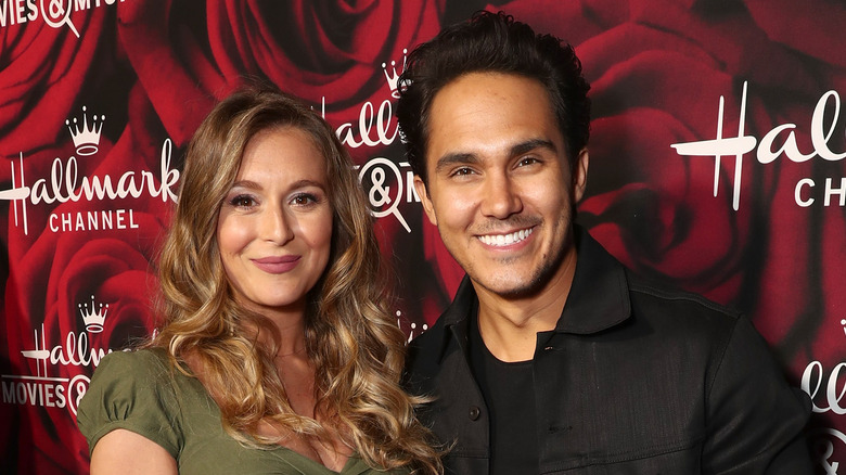 Alexa and Carlos PenaVega smiling