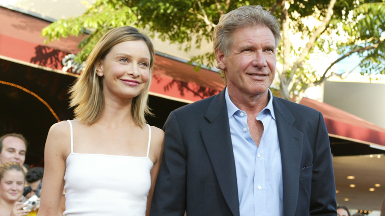 Calista Flockhart and Harrison Ford walking