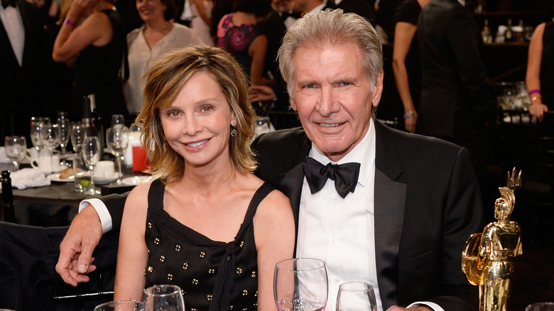 Calista Flockhart and Harrison Ford posing