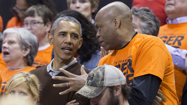 Barack Obama and Craig Robinson at an NCAA game