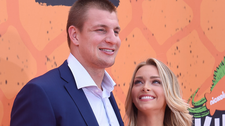 Camille Kostek gazing up at Rob Gronkowski