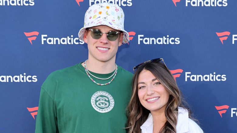 Joe Burrow and Olivia Holzmacher smiling