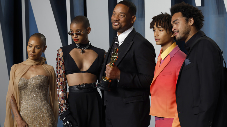 Will Smith and Jada Pinkett Smith posing with their children