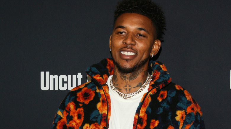 Nick Young smiling at the Uncut Gems premiere