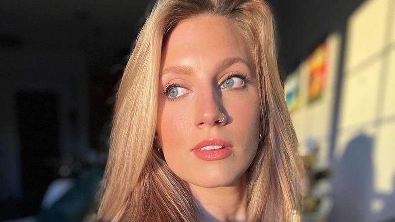 Olivia Plath looking over
