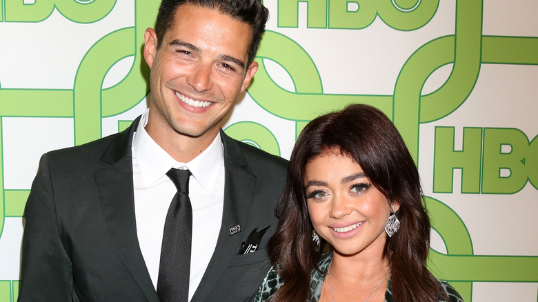 Wells Adams and Sarah Hyland smiling