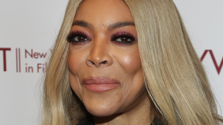 Wendy Williams false eye lashes brown lip