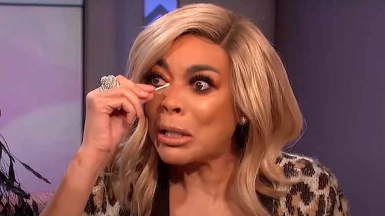 Wendy Williams wiping her tears with q-tips