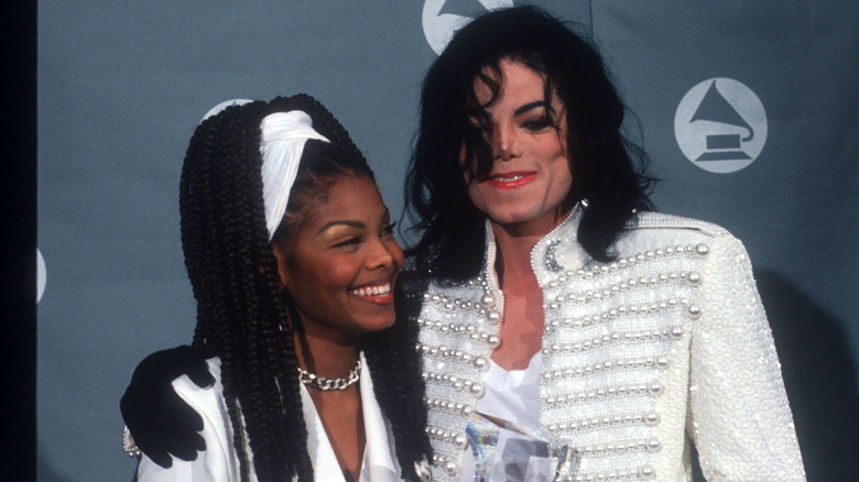 Janet and Michael Jackson smiling