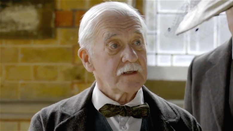 Bernard Gallagher speaking during a scene in Downton Abbey