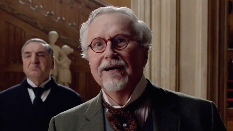 Christopher Rozycki acting happy in a scene from Downton Abbey