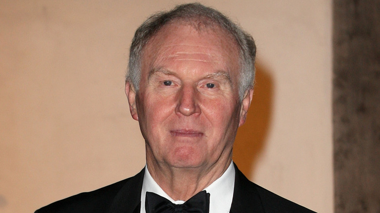 Tim Pigott-Smith posing in a suit