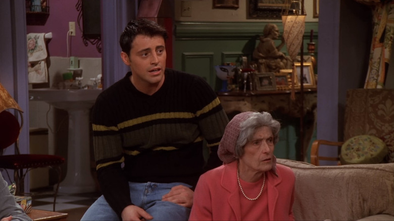 Lilyan Chauvin as Nonnie sitting with Joey