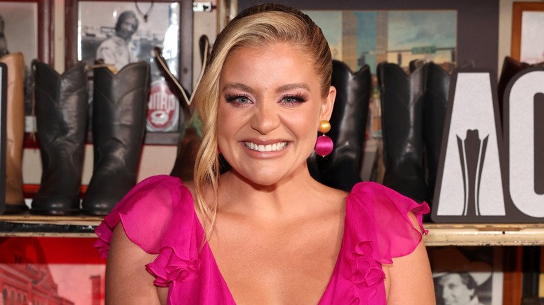 Lauren Alaina smiling in pink dress