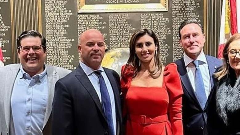 Alina Habba with her husband and others