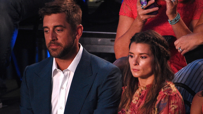 Aaron Rodgers, Danica Patrick looking sad