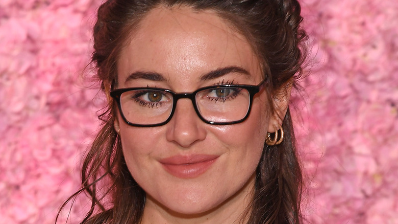 Shailene Woodley smiling in glasses